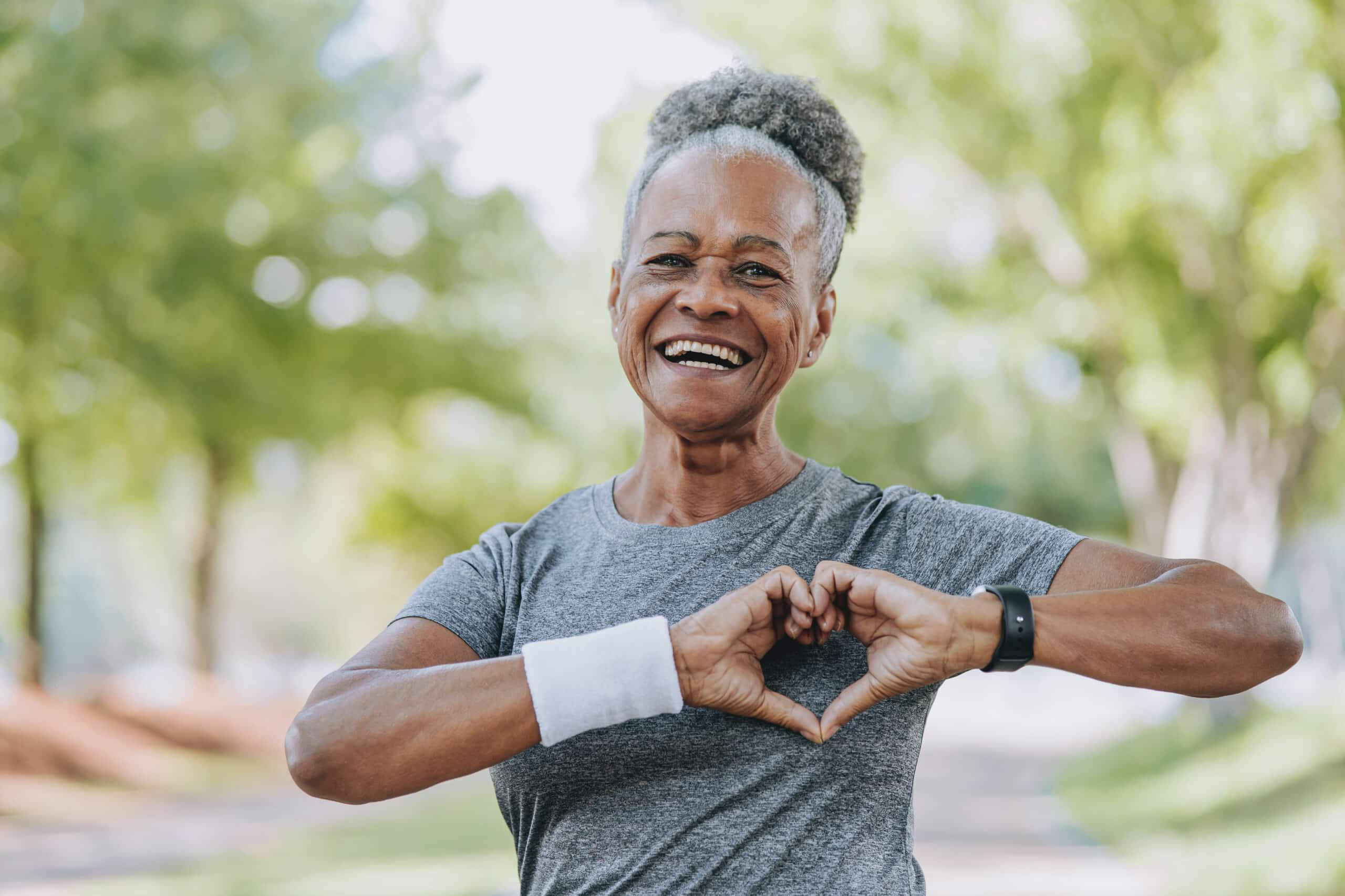 Senior woman heart symbol